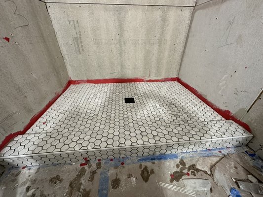Installation, tiles
Installation, tiles - Laying tiles on the floor in the shower. Installation, tiles
Installation, tiles - Laying tiles on the floor in the shower.