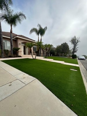 Artificial Turf Project 2024 - At Graceland Remodeling, our artificial turf installation process is designed to transform your outdoor space into a lush, low-maintenance area that looks beautiful year-round. We begin with a free consultation where we assess your site and discuss your vision. After that, we prepare the area by removing existing grass and debris, leveling the ground, and installing a weed barrier. Once the base is ready, we roll out and cut the turf to fit your space, ensuring a seamless, natural appearance. We then apply an infill material to help the turf blades stand upright, giving it a realistic feel. Finally, we inspect the installation and leave your space clean and ready for use. With durable, eco-friendly artificial turf, you can enjoy a green, vibrant lawn without the hassle of watering or mowing. Artificial Turf Project 2024 - At Graceland Remodeling, our artificial turf installation process is designed to transform your outdoor space into a lush, low-maintenance area that looks beautiful year-round. We begin with a free consultation where we assess your site and discuss your vision. After that, we prepare the area by removing existing grass and debris, leveling the ground, and installing a weed barrier. Once the base is ready, we roll out and cut the turf to fit your space, ensuring a seamless, natural appearance. We then apply an infill material to help the turf blades stand upright, giving it a realistic feel. Finally, we inspect the installation and leave your space clean and ready for use. With durable, eco-friendly artificial turf, you can enjoy a green, vibrant lawn without the hassle of watering or mowing.