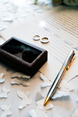 Wedding Officiant - “A wedding ring, a pen, and a document are symbols of love, commitment, and trust. Every signature tells a story, and every ring carries a promise. Whether it’s vows, agreements, or life milestones, I’m here to make those moments official.” Wedding Officiant - “A wedding ring, a pen, and a document are symbols of love, commitment, and trust. Every signature tells a story, and every ring carries a promise. Whether it’s vows, agreements, or life milestones, I’m here to make those moments official.”