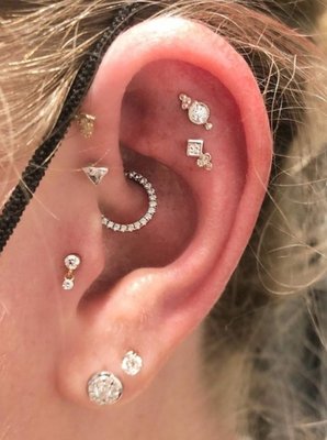 Piercing - Since we started piercing it has always been our priority to create a clean, comfortable, educational and professional environment for all clients. We have extensive knowledge and experience in all types of piercings. We truly enjoys the sparkle in someone's eyes when they take that first look of their new piercing in the mirror. Piercing - Since we started piercing it has always been our priority to create a clean, comfortable, educational and professional environment for all clients. We have extensive knowledge and experience in all types of piercings. We truly enjoys the sparkle in someone's eyes when they take that first look of their new piercing in the mirror.
