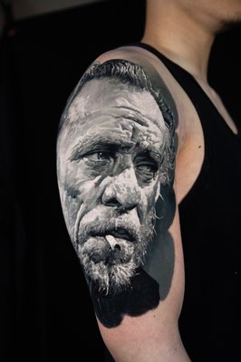 Portrait Tattoo - We would like to present you this wonderful piece which was done in a 2 days. Whole process took around 18 hours of tattooing. Placement - upper arm.