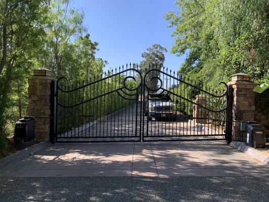 Custom swing gates with lift master operators. - Wrought iron fence with lift master swing gate operator. Call for estimate 805 750-2040 Custom swing gates with lift master operators. - Wrought iron fence with lift master swing gate operator. Call for estimate 805 750-2040