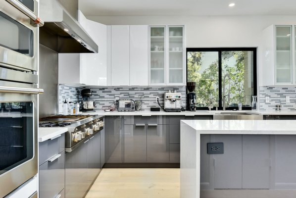 Kitchen remodel - Our curated collection exemplifies the essence of contemporary design, featuring an array of minimalist yet striking cabinet creations. These cabinets are more than storage; they're statements of modern living, embodying clean lines, exquisite finishes, and innovative functionality. Explore the seamless integration of form and function as we redefine kitchen spaces with a touch of modern elegance. Indulge in the beauty of simplicity while embracing the future of kitchen design.