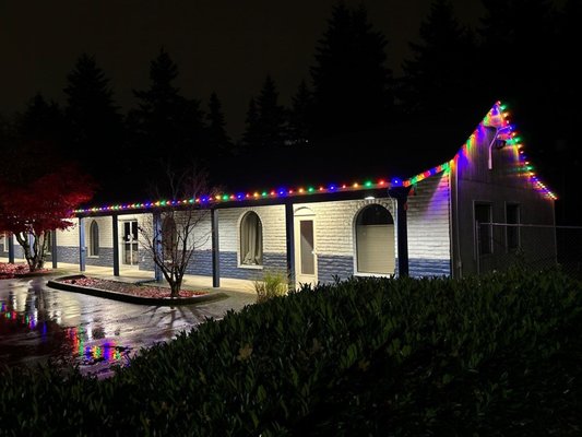 Christmas Lighting on a Commercial Building - We completed a stunning Christmas lighting project on a commercial building in Vancouver, WA. Our team designed and installed vibrant multicolored lights that highlighted the building's architecture, creating a festive and welcoming atmosphere. The carefully arranged lights were tailored to enhance visibility and attract attention, offering a cheerful holiday display for employees, customers, and passersby to enjoy throughout the season. Christmas Lighting on a Commercial Building - We completed a stunning Christmas lighting project on a commercial building in Vancouver, WA. Our team designed and installed vibrant multicolored lights that highlighted the building's architecture, creating a festive and welcoming atmosphere. The carefully arranged lights were tailored to enhance visibility and attract attention, offering a cheerful holiday display for employees, customers, and passersby to enjoy throughout the season.