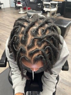 Loc Maintenance - This service comes with a stimulating detox shampoo and moisture conditioning. Each client receives knowledge about their loc journey and receives proper loc maintenance techniques of a retwist, interlocking, or repair. Request a hair consultation if you are unsure about what to do with your locs. Products used can be bought for take home care between visits. Loc Maintenance - This service comes with a stimulating detox shampoo and moisture conditioning. Each client receives knowledge about their loc journey and receives proper loc maintenance techniques of a retwist, interlocking, or repair. Request a hair consultation if you are unsure about what to do with your locs. Products used can be bought for take home care between visits.
