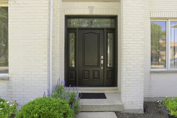 ProVia Signet Door 2026 - For this Plainfield, IL project, Opal Exteriors removed rotted wood at the base of the entryway and restored the area before installing a new ProVia Signet entry door.

The new entry features a rich, dark exterior finish, decorative glass sidelights, and a coordinating transom. Inside, a crisp white finish complements the home’s warm wood trim. From the restored base to the finishing details, this transformation highlights the care that goes into a beautiful, properly installed entrance.