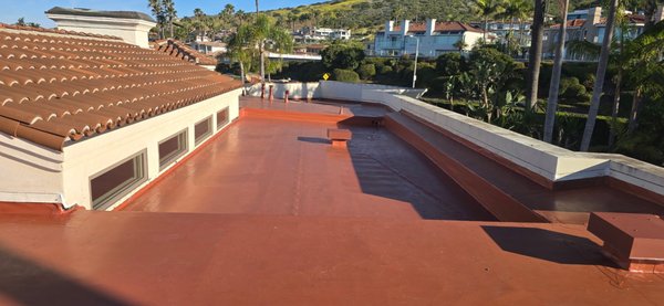 Irvine Cove - This project focused on restoring the flat roof system while leaving the existing clay tile roof untouched.
The photos show a fully sealed, seamless waterproof coating across all flat sections, including proper sealing of vents, pipes, and skylight penetrations, along with reinforced transitions at walls and elevation changes.
Flat roof areas like this are the most common source of leaks, especially on homes with tile roofing systems. Irvine Cove - This project focused on restoring the flat roof system while leaving the existing clay tile roof untouched.
The photos show a fully sealed, seamless waterproof coating across all flat sections, including proper sealing of vents, pipes, and skylight penetrations, along with reinforced transitions at walls and elevation changes.
Flat roof areas like this are the most common source of leaks, especially on homes with tile roofing systems.