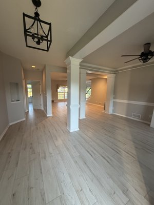 Dallas, GA - Laminate Installation - Beautiful transformation! From a dark flooring to a very well installed light flooring to brighten the space.