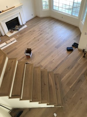Hardwood Flooring Installation - Hardwood is one of the most popular flooring choices in homes throughout the United States. At ASAP Flooring Services, we have the expertise and knowledge of all the great features and benefits hardwood flooring has to offer. Understanding this versatile flooring material and its functionality can help you decide if hardwood is the right choice for your home. Hardwood flooring adds warmth and a classic charm to any room. It is one of the oldest flooring materials that has been used over time and seems to never go out of style with its raw and beautiful look.