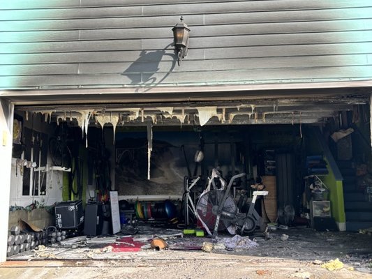 Fire Damage In Garage - The Garage/Home gym experienced an unfortunate fire. We put it back together to be good as new.