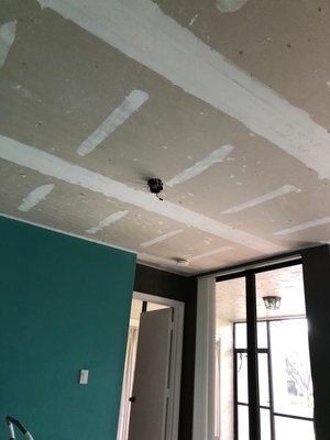 Сrafting drywall board ceilings - Crafty Fix Crew specializes in crafting gypsum board ceilings, delivering a seamless blend of functionality and aesthetics to your space. Our recent project involved the construction of a gypsum board ceiling, followed by meticulous taping and finishing to achieve a flawless surface. With expertise in all aspects of gypsum board work, we handle every detail with precision, from installation to finishing touches. Whether it's concealing wiring, improving acoustics, or simply enhancing the visual appeal of your space, our team is equipped to meet your needs. Trust Crafty Fix Crew for expert craftsmanship and exceptional results in all your gypsum board projects.