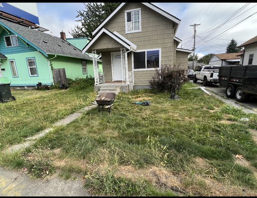 Lawn and sidewalk removal - We removed the sidewalk, and lawn replaced with shrubs and gravel/flagstone path Lawn and sidewalk removal - We removed the sidewalk, and lawn replaced with shrubs and gravel/flagstone path