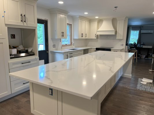 Quartz countertops with a huge island! - This kitchen was done using Quartz Countertops with a Calacatta look. The color was an excellent choose!