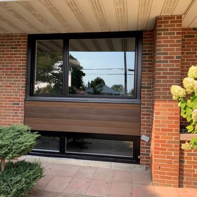 Front Window and Door Makeover - This modern style window and door totally change the entire look of the entire home.  From a 60+ year old home we converted it to look like a brand new home.