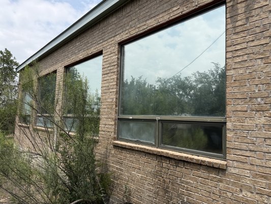 Shop Garage Windows Tinted for Maximum comfort - This garage featured expansive windows, allowing ample natural light and scenic views but also causing significant heat buildup. Mother's Window Tint resolved this issue by installing commercial-grade Solar Silver window film across the entire structure. The result was a substantial improvement in heat reduction and enhanced privacy, making the space much more comfortable. Beat the Texas heat and save with Mother's! Shop Garage Windows Tinted for Maximum comfort - This garage featured expansive windows, allowing ample natural light and scenic views but also causing significant heat buildup. Mother's Window Tint resolved this issue by installing commercial-grade Solar Silver window film across the entire structure. The result was a substantial improvement in heat reduction and enhanced privacy, making the space much more comfortable. Beat the Texas heat and save with Mother's!