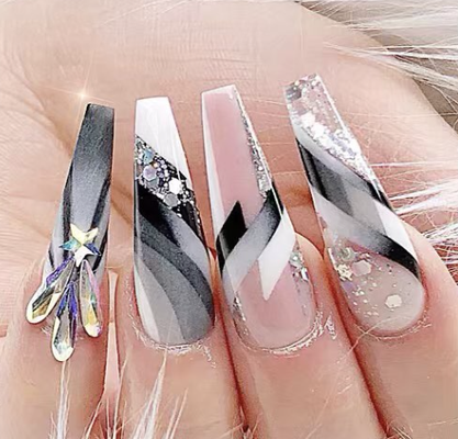 Acrylic Nails - Classic Acrylic Nails are a fan favorite.  Long, short or in between, we'll get your nails looking great!