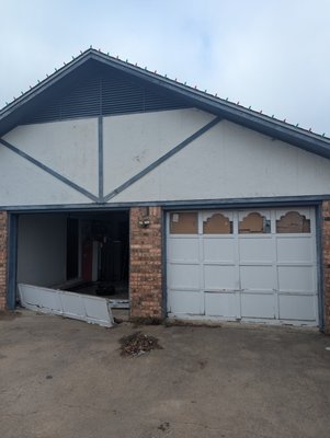 Garage door upgrade - Upgraded these old wooden doors with new steel doors.