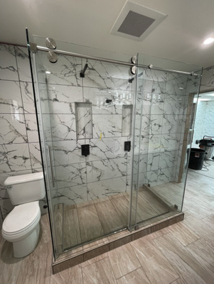 Tracked Shower Doors - Here are some of our shower doors and glass on tracks. Give us a call or request a quote today!