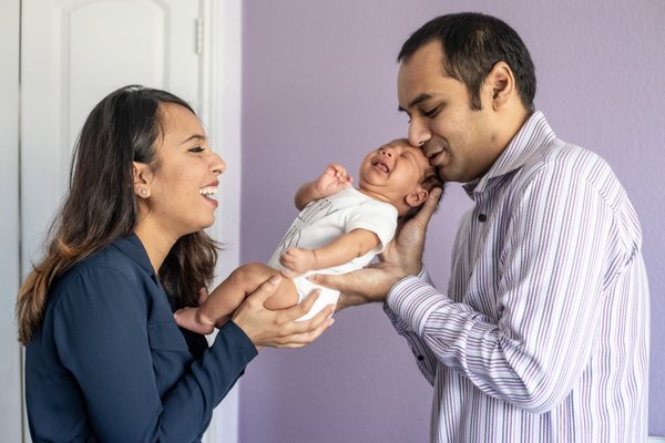 Sabrin and Family - I get a lot of questions about my newborn photography, and the answer is - it's a lot like my other photography! While I love the baby-in-a-basket look, my style is more candid, with mom and dad (and sometimes sister and pet!) heavily involved.