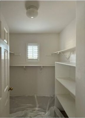 Walk-In Closet Refresh - Walk-in closet refreshed with new two-tone paint. Walk-In Closet Refresh - Walk-in closet refreshed with new two-tone paint.