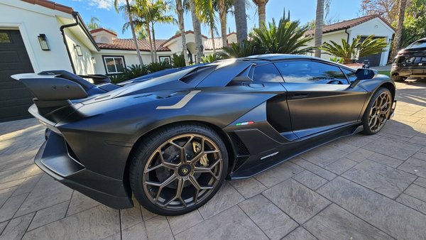 Lamborghini Aventador - custom color bronze gold wheel repair for this beautiful  Lamborghini Aventador. on site at customer location.