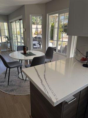 SPC vinyl and kitchen remodel - SPC Waterproof vinyl all downstairs and stairs with white melimin kitchen remodel with cabinets and countertops