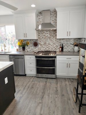 "Kitchen Remodel" - This is a complete kitchen tear down. We did a custom design layout for the kitchen to improve functionality and flow! We also added a large island that included mic-wave & trash bins with plenty added of storage. My clients loves to cook for the large family! It turned out Beautifully! "Kitchen Remodel" - This is a complete kitchen tear down. We did a custom design layout for the kitchen to improve functionality and flow! We also added a large island that included mic-wave & trash bins with plenty added of storage. My clients loves to cook for the large family! It turned out Beautifully!
