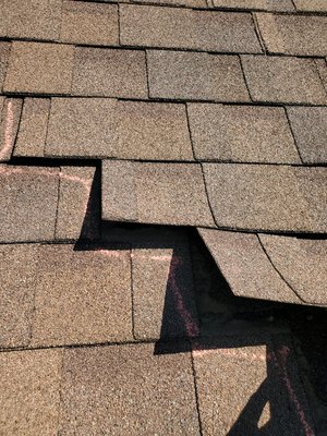 Roof inspection after a wind storm. - This was caused by Highwinds.