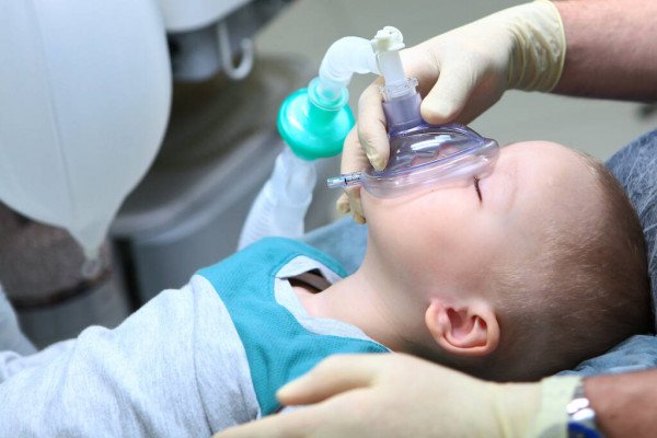 Pediatric Dentistry - Our highly-skilled, experienced and trained team provides comprehensive pediatric dental treatment under general anesthesia for your child in a safe, and gentle environment. We serve infants, children, and children with special health care needs in Pittsburgh & surrounding areas, including Northern West Virgina and Eastern Ohio.
Our team is made up of Pediatric Dentists, Physician Anesthesiologists, Certified Registered Nurse Anesthetists (CRNA) Operating Room Technicians (OR Techs,) and Registered Nurses (RN) We work together to offer your child the quality hospital-style care they deserve without long wait times for appointments, the hassle of dealing with the hospital, or the cost of hospital care.
Many dentists (including other pediatric dentists,) pediatricians, early childhood programs, school nurses, and Medicaid, CHIP, and other insurance programs refer children to us for comprehensive dental treatment under general anesthesia. We also receive many patient referrals from parents and caregivers of children we have already successfully treated.
Full mouth rehabilitation under General Anesthesia is safe, efficient, affordable, and allows us to provide excellent care for our pediatric dental patients. Our priority is safe, gentle, quality dental care for ALL children, regardless of race, ethnicity, or socio-economic level.
We are here for you and your child. Pediatric Dentistry - Our highly-skilled, experienced and trained team provides comprehensive pediatric dental treatment under general anesthesia for your child in a safe, and gentle environment. We serve infants, children, and children with special health care needs in Pittsburgh & surrounding areas, including Northern West Virgina and Eastern Ohio.
Our team is made up of Pediatric Dentists, Physician Anesthesiologists, Certified Registered Nurse Anesthetists (CRNA) Operating Room Technicians (OR Techs,) and Registered Nurses (RN) We work together to offer your child the quality hospital-style care they deserve without long wait times for appointments, the hassle of dealing with the hospital, or the cost of hospital care.
Many dentists (including other pediatric dentists,) pediatricians, early childhood programs, school nurses, and Medicaid, CHIP, and other insurance programs refer children to us for comprehensive dental treatment under general anesthesia. We also receive many patient referrals from parents and caregivers of children we have already successfully treated.
Full mouth rehabilitation under General Anesthesia is safe, efficient, affordable, and allows us to provide excellent care for our pediatric dental patients. Our priority is safe, gentle, quality dental care for ALL children, regardless of race, ethnicity, or socio-economic level.
We are here for you and your child.