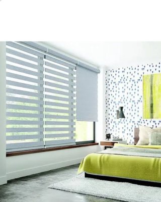Zebra or Z Shades - Z Shades also known as Zebra Shades are a dual shade that combines alternating sheer and solid fabric that will give you both the look of a sheer drapery and a horizontal blind combined.
excellent light control and privacy.
all Z or Zebra Shades are available in an array of different patterns and colors.

Wireless remote control motorized available on all Shades at a minimal additional cost
