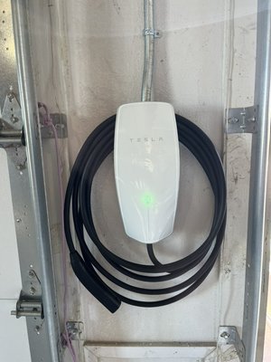 December Tesla charger install hooked up with 60 amps! - Here is a recent Tesla charger install 45 feet of conduit surface mounted in garage hooked up with 6/3 wire to handle the 60 amp load for best use of charger! December Tesla charger install hooked up with 60 amps! - Here is a recent Tesla charger install 45 feet of conduit surface mounted in garage hooked up with 6/3 wire to handle the 60 amp load for best use of charger!