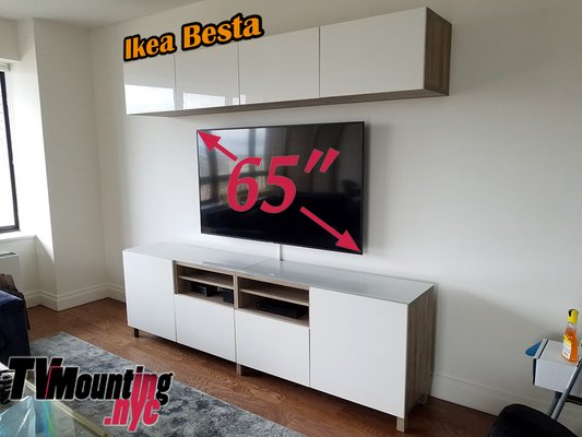 TV Mounted with Ikea Besta Cabinets - Such a sweet living room set up!
65" TV mounted with floor and wall Ikea Besta cabinets, wires running in a white raceway concealer for clean look! A gem! TV Mounted with Ikea Besta Cabinets - Such a sweet living room set up!
65" TV mounted with floor and wall Ikea Besta cabinets, wires running in a white raceway concealer for clean look! A gem!