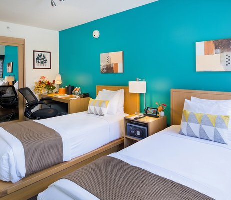 Cosmopolitan Twin Twin - Perfect for solo travelers or friends vacationing together, these relaxing rooms feature a flat-screen TV, a mini-fridge, and a bathroom with shower/tub combo that lets you get ready for another day of exploring the island. Cosmopolitan Twin Twin - Perfect for solo travelers or friends vacationing together, these relaxing rooms feature a flat-screen TV, a mini-fridge, and a bathroom with shower/tub combo that lets you get ready for another day of exploring the island.