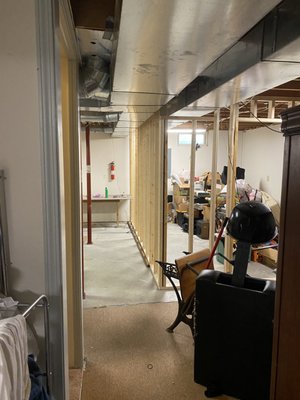 Apartment add on - This remodel was done in the basement of the customers home.  We framed the walls, knocked out a wall to put in a snack bar.  Created 2 bedrooms and a storaage room.