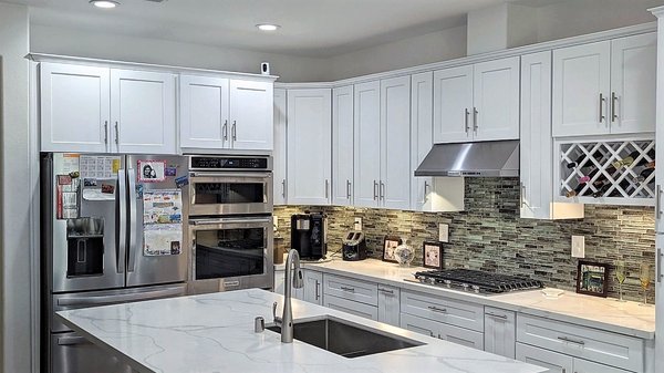 KITCHEN REMODEL - A kitchen remodel is one of the most popular and effective ways to increase the value of your home. It can also make your kitchen more functional and enjoyable to use.

When planning your kitchen remodel, it's essential to consider your budget, needs, and aesthetic preferences. You may want to make minor changes, such as updating the cabinets or countertops, or you may want to do a complete makeover, including changing the kitchen layout.

Here are some of the most popular kitchen remodeling projects:

Cabinet replacement: New cabinets can give your kitchen a new look and feel. You can choose various materials, styles, and finishes to match your taste and budget.

Kitchen remodel cabinets
Countertop replacement: New countertops can also make a big difference in the appearance and functionality of your kitchen. Many different types of countertops are available, including granite, marble, quartz, and laminate.

Kitchen remodel countertops
Backsplash replacement: A new backsplash can add a touch of style and personality to your kitchen. It can also protect your walls from splashes and spills.

Kitchen remodel backsplash
Appliance replacement: New appliances can make your kitchen more functional and energy-efficient. When you choose new appliances, please select models that fit your needs and budget.

Kitchen remodel appliances
Island addition: Adding a kitchen island is a great way to create more workspace and storage. Kitchen islands can also be used for seating and entertaining.

Kitchen remodel island
Layout change: If your kitchen layout is outdated or inefficient, consider changing it. This may involve moving walls, adding new windows, or changing the placement of cabinets and appliances.

Kitchen remodel layout
No matter what your budget or needs are, there is a kitchen remodeling project that is right for you. By carefully planning and executing your remodel, you can create a beautiful and functional kitchen.

Here are some additional tips for kitchen remodeling:

Could you hire a qualified contractor? A qualified contractor can help you plan and execute your remodel smoothly and efficiently.
Get multiple estimates. Be sure to get estimates from various contractors before you make a decision. This will help you get the best possible price for your remodel.
Be prepared for disruption. A kitchen remodel can be a disruptive process. Could you be sure to plan and arrange cooking and eating during the construction period?
Remember the details. When you plan your kitchen remodel, please consider all the details, such as lighting, plumbing, and electrical work.
Enjoy your new kitchen! Once your kitchen remodel is complete, could you take some time to enjoy your new space? You'll be glad you invested.