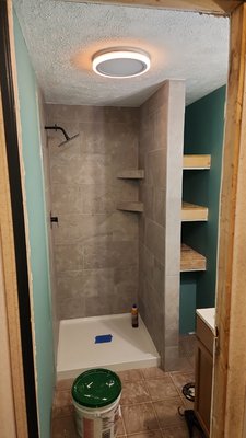 Tile shower - This was a small bathroom remodel that was gutted and went back with new sub-floor, sheetrock, vanity, and stand-up tile shower. Tile shower - This was a small bathroom remodel that was gutted and went back with new sub-floor, sheetrock, vanity, and stand-up tile shower.