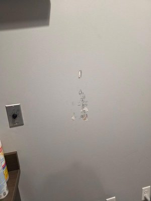 Wall repaired and painted - This project was completed for Andrew D. Johnson OD Your Eye Care & Contact Lens. We addressed and rectified existing wall damage through repair and painting services.