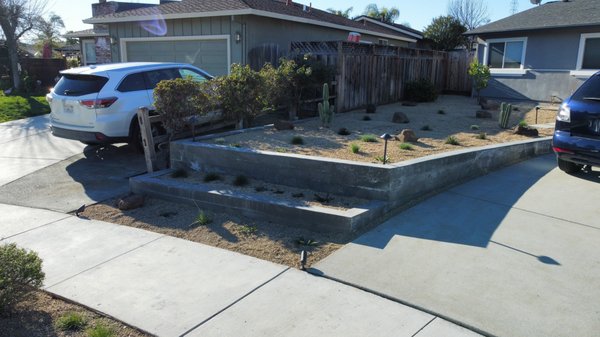 Front Yard Retaining Wall - We add this beautiful retaining wall and add some drought resistant plants. Clean and low maintenance. Front Yard Retaining Wall - We add this beautiful retaining wall and add some drought resistant plants. Clean and low maintenance.