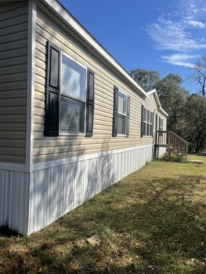 Mobile Home Pressure Wash - This was a home that had some mildew buildup due to moisture.  Resident requested the mildew to be removed.