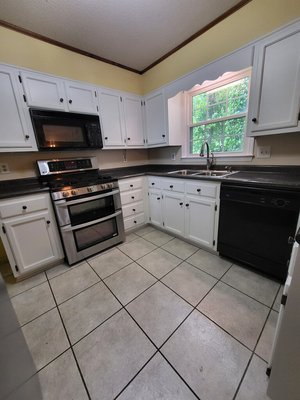 Refinishing old doors - Refinishing old dark stained doors and frames to a pure white to brighten up the area Refinishing old doors - Refinishing old dark stained doors and frames to a pure white to brighten up the area