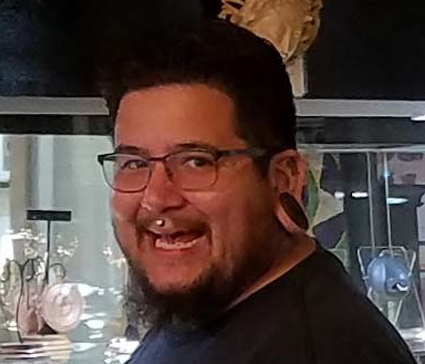 Body Piercer: Gill - Gill has been a body piercer since 2003. He is a proud member of the Association of Professional Piercers. He is available for body piercings at each of our locations. He specializes in Micro Dermal Anchor Piercings, Surface Piercings, Children's Ear Piercings, Industrial Ear Piercings, Large Gauge/Conch Piercings, Tongue Piercings, Ear Projects, Triple Forward Helix Piercings, Lip Piercings, Snake Bites, Female/Male Genital Piercings, and Nostril/Septum Piercings. Body Piercer: Gill - Gill has been a body piercer since 2003. He is a proud member of the Association of Professional Piercers. He is available for body piercings at each of our locations. He specializes in Micro Dermal Anchor Piercings, Surface Piercings, Children's Ear Piercings, Industrial Ear Piercings, Large Gauge/Conch Piercings, Tongue Piercings, Ear Projects, Triple Forward Helix Piercings, Lip Piercings, Snake Bites, Female/Male Genital Piercings, and Nostril/Septum Piercings.
