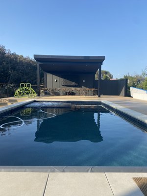 Kensington backyard renovation - Completely transformed the backyard into a luxury relaxation station. From watching tv in the pool to eating a nice barbecue with your family for an outdoor dinner this backyard has it all! Wonderful view of the canyon and lots of space for sun bathing. This backyard is the place where you host the summer pool parties!