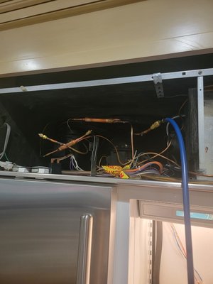 SubZero refrigerator repair - SubZero refrigerator starts to show "service" error. My customer called me as usual. I found that there is not enough freon pressure in the fresh food section coils. As I have great experience in repairing SubZero refrigerators, I started to check evaporator for leaks. Found several leaks. So, I ordered a new evaporator and replaced it. To be sure, there is no any water or air inside coils. I made a vacuumation. After that, I filled in a new freon in the system to leave it there for many, many years.
