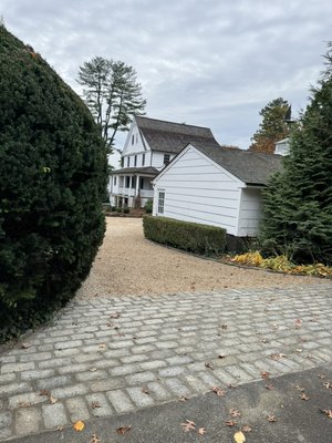 Our Greenwich Driveway Remodel - Check out our Chip and Tar Driveway installation and belgium block apron in Greenwich! Eco friendly solution brought to our client that originally wanted to remove and repave an old asphalt driveway. We both fell in love with this warm and welcoming transformation! Our Greenwich Driveway Remodel - Check out our Chip and Tar Driveway installation and belgium block apron in Greenwich! Eco friendly solution brought to our client that originally wanted to remove and repave an old asphalt driveway. We both fell in love with this warm and welcoming transformation!