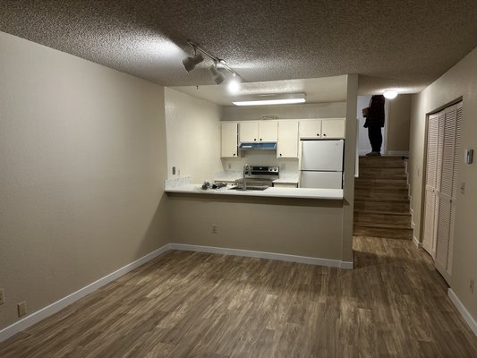 Flooring and Baseboard - This project was completed at the end of October in Auburn. Removing carpeting, installing vinyl floors and baseboards.