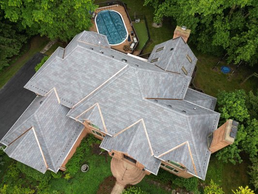 DaVinci Roofscapes Project - Homeowner previously had cedar that was old and damaged. We worked with their insurance company for a full roof placement! They chose go with this beautiful DaVinci Slate style system! DaVinci Roofscapes Project - Homeowner previously had cedar that was old and damaged. We worked with their insurance company for a full roof placement! They chose go with this beautiful DaVinci Slate style system!