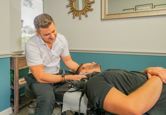 Chiropractic Adjustment - Dr Tarjoman uses vibration/percussion therapy prior to the manual manipulation to loosen up the muscles so patients hold their adjustments longer.  Gentle yet thorough treatments.