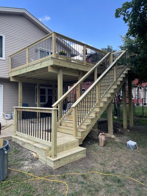 Second story deck remodel - This was a new, second-story deck remodel with a custom railing and gate system. Second story deck remodel - This was a new, second-story deck remodel with a custom railing and gate system.