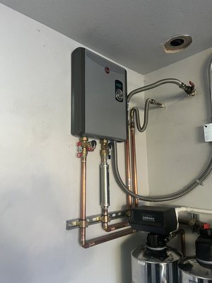 Tankless water heater upgrade - Our customer was experiencing large amounts of scale build up in the water delivery system, causing failures to the faucets and fixtures. We were able to give them an immediate solution by installing flush valves to allow us to maintain the system. As an added protection, we installed an anti-scale device, which collects hard water deposits before they enter into the heating system. This allows for longer periods between maintenance and increases the life expectancy of the system. Tankless water heater upgrade - Our customer was experiencing large amounts of scale build up in the water delivery system, causing failures to the faucets and fixtures. We were able to give them an immediate solution by installing flush valves to allow us to maintain the system. As an added protection, we installed an anti-scale device, which collects hard water deposits before they enter into the heating system. This allows for longer periods between maintenance and increases the life expectancy of the system.