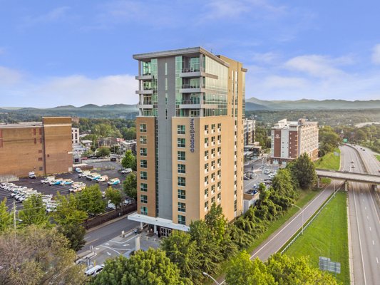 Commercial Aerial Photography - Hotel Indigo's Grand Re-Opening after their $6 Million Recent Remodel - showing off its best angles from a higher perspective!